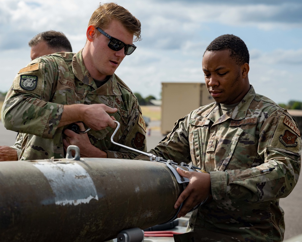 23rd Aircraft Maintenance Unit Aircraft Armament Systems Specialists and 5th Munitions Squadron Munitions Systems Maintenance Specialists Build Munitions