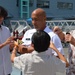 Naval Museum hosts a promotion ceremony for Navy Expeditionary Combat Command on Battleship Wisconsin