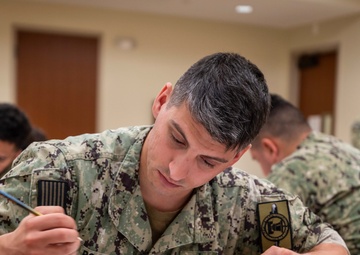 Sailors participate in the Navywide E6 advancement exam