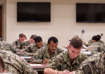 Sailors participate in the Navywide E6 advancement exam