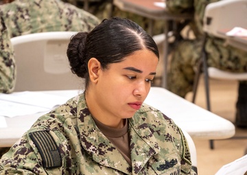 Sailors participate in the Navywide E6 advancement exam