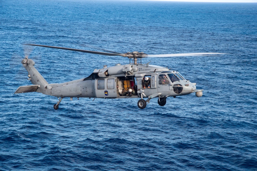 USS America (LHA 6) Conducts Flight Operations with Helicopter Sea Combat (HSC) Squadron 25
