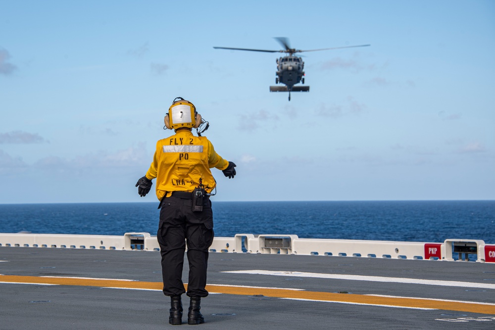 USS America (LHA 6) Conducts Flight Operations with Helicopter Sea Combat (HSC) Squadron 25