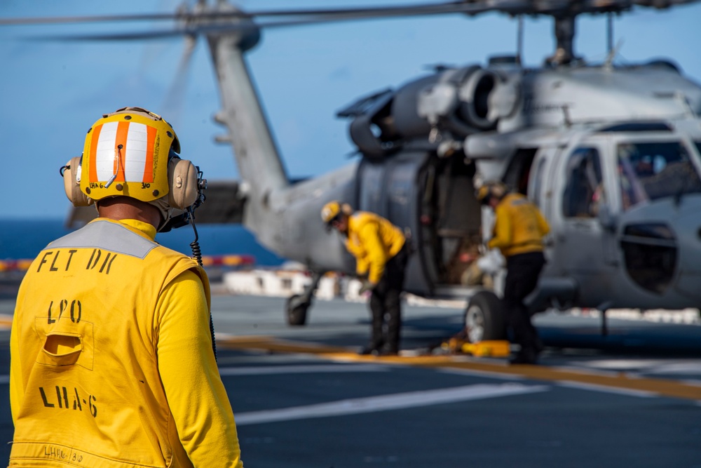 USS America (LHA 6) Conducts Flight Operations with Helicopter Sea Combat (HSC) Squadron 25