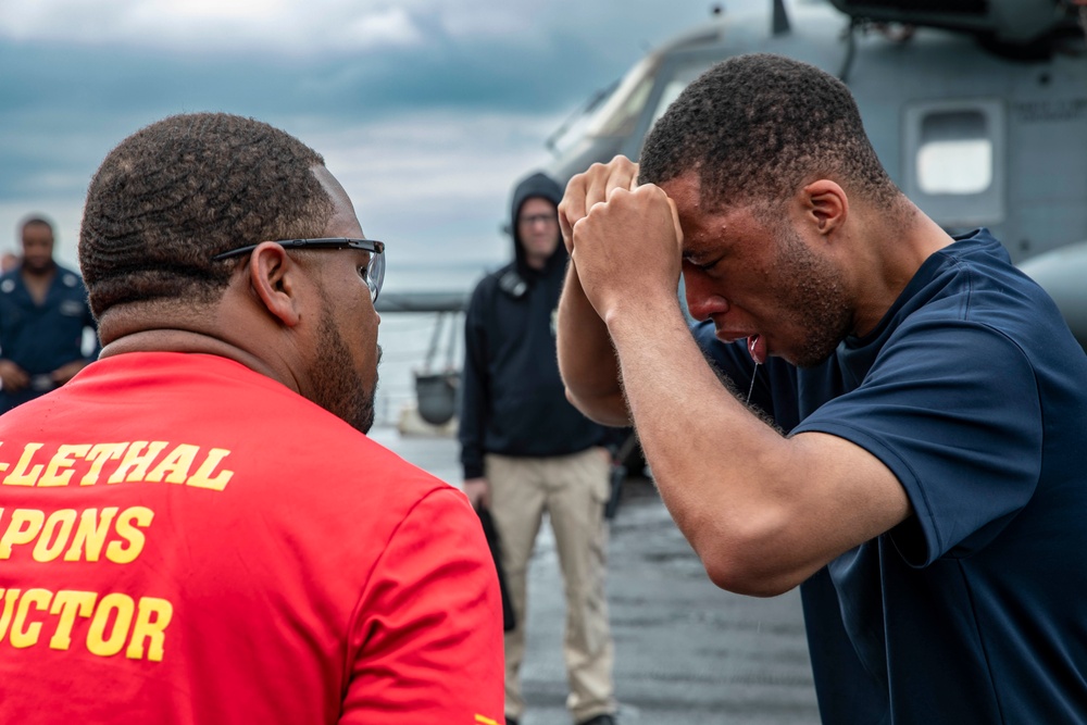 USS Arlington Sailors take on security reaction force training