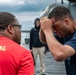 USS Arlington Sailors take on security reaction force training