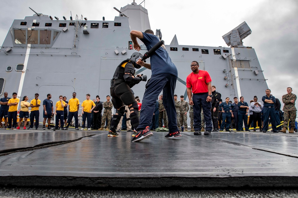 USS Arlington Sailors take on security reaction force training