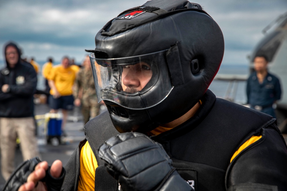 USS Arlington Sailors take on security reaction force training