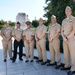 LCDR Brittni King with fellow Seabees at her promotion ceremony