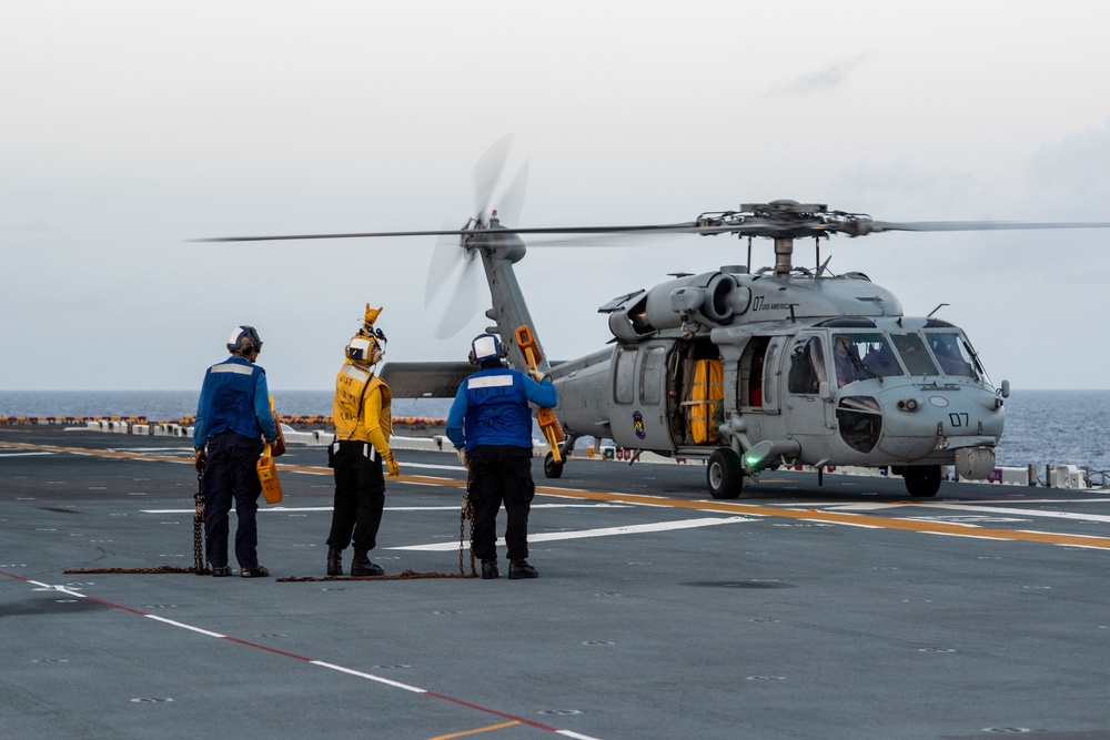 USS America (LHA 6) Conducts Vertical Replenishment Exercise With Helicopter Sea Combat (HSC) Squadron 25