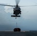 USS America (LHA 6) Conducts Vertical Replenishment Exercise With Helicopter Sea Combat (HSC) Squadron 25