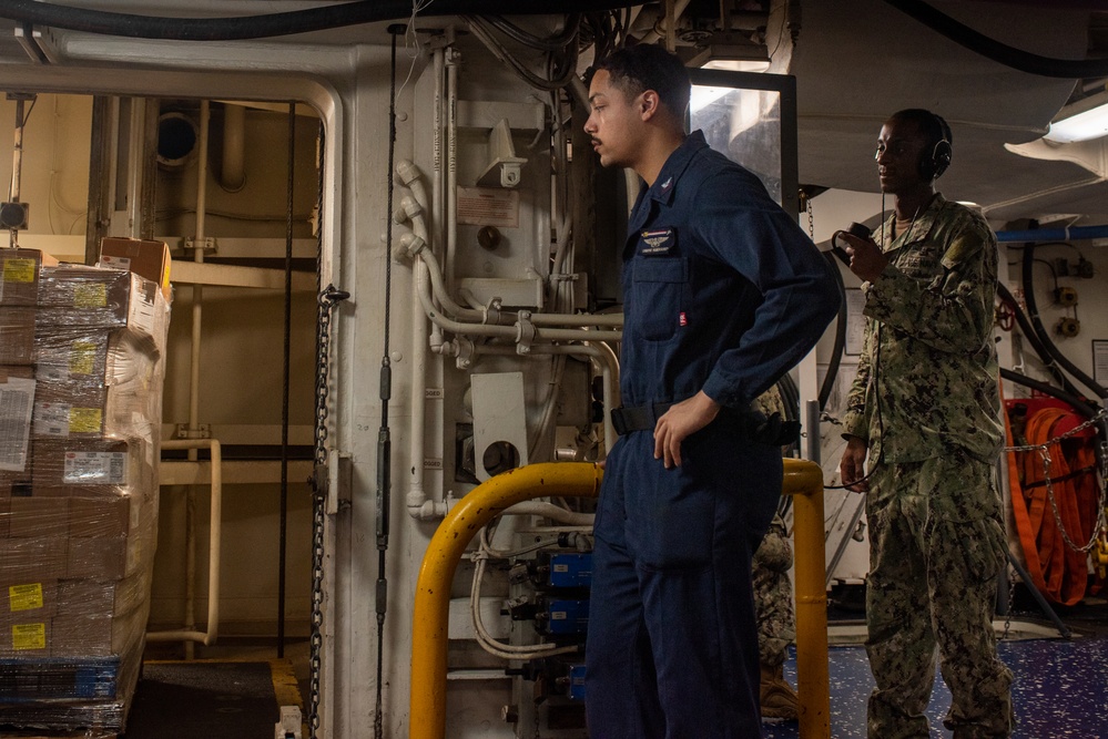 USS Ronald Reagan (CVN 76) Sailors operate freight elevators