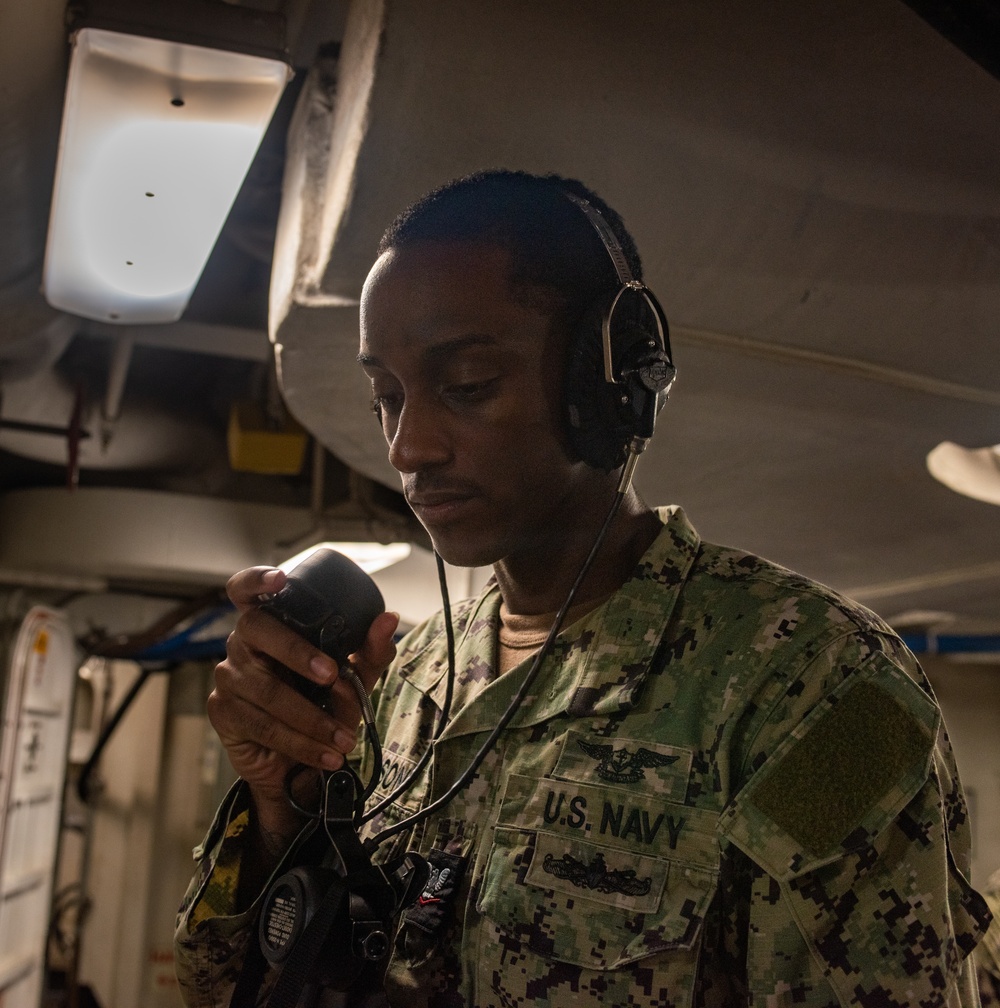 USS Ronald Reagan (CVN 76) Sailors operate freight elevators