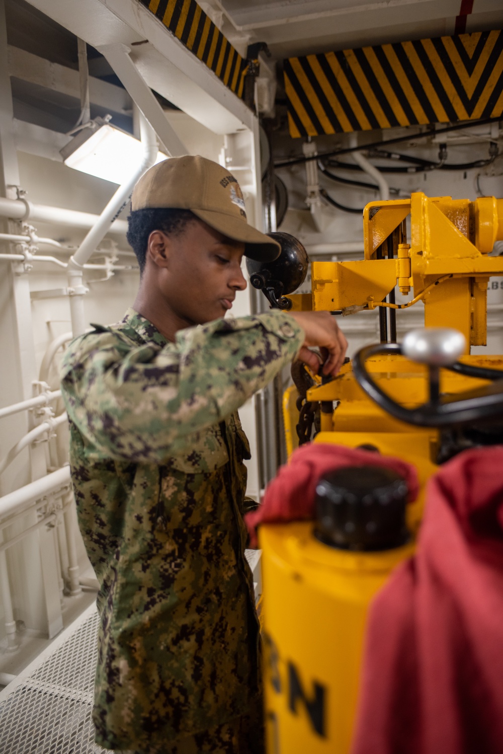 USS Ronald Reagan (CVN 76) Sailors conduct rust control and maintenance