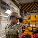 USS Ronald Reagan (CVN 76) Sailors conduct rust control and maintenance