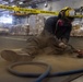 USS Ronald Reagan (CVN 76) Sailors conduct rust control and maintenance