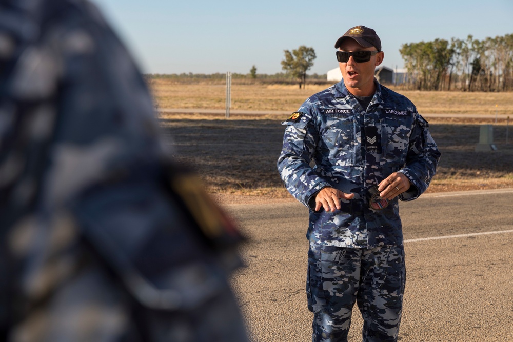 U.S. Marines, RAAF, and RNZAF firefighters conduct conditioning training