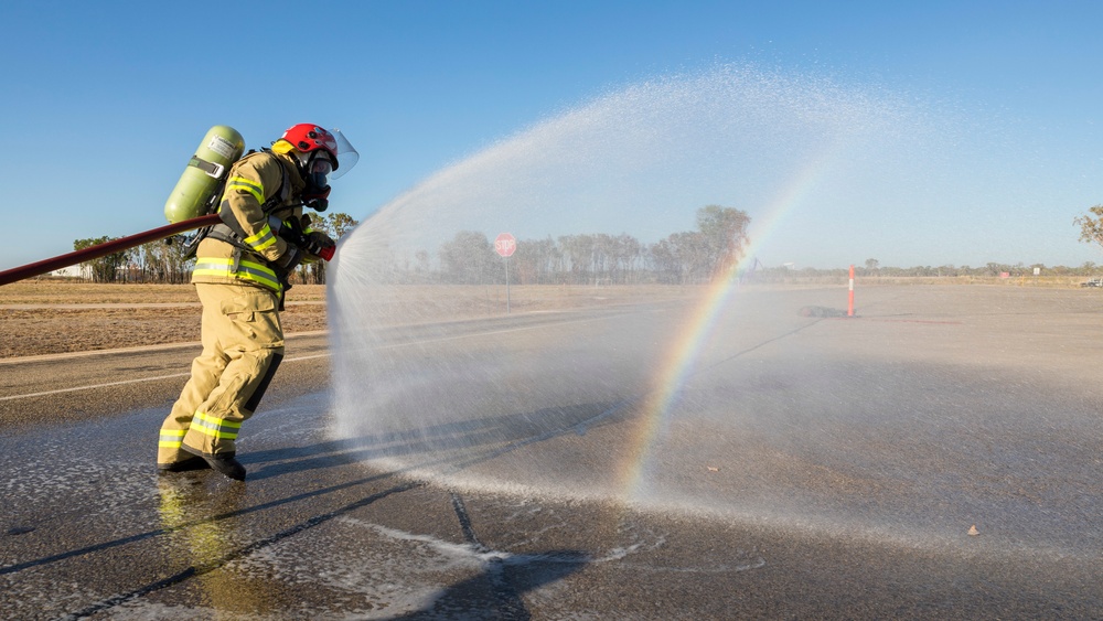 U.S. Marines, RAAF, and RNZAF firefighters conduct conditioning training