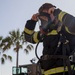 U.S. Marines, RAAF, and RNZAF firefighters conduct conditioning training