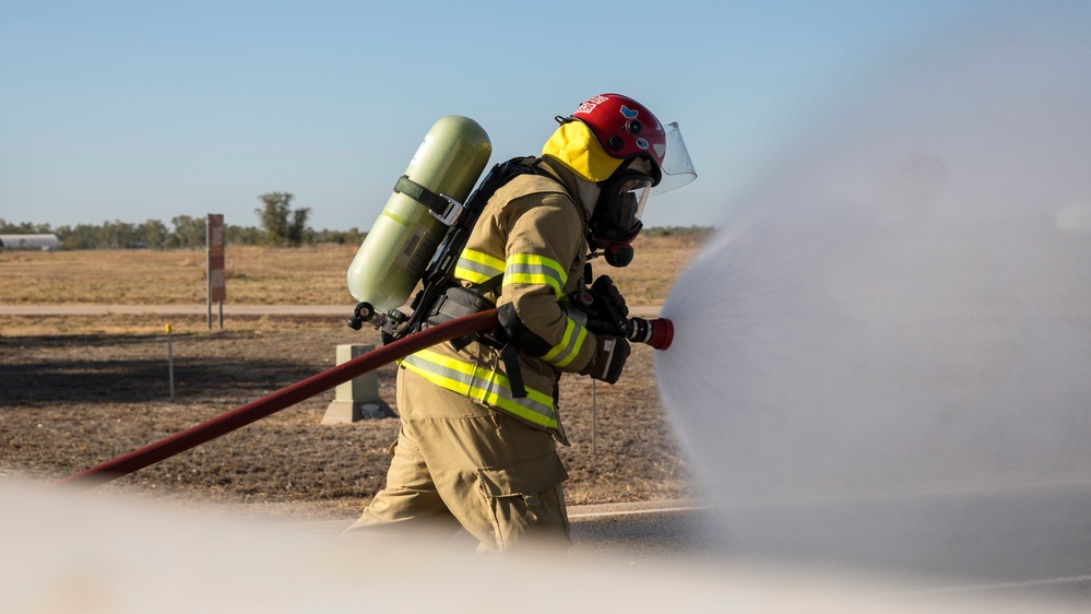 U.S. Marines, RAAF, and RNZAF firefighters conduct conditioning training