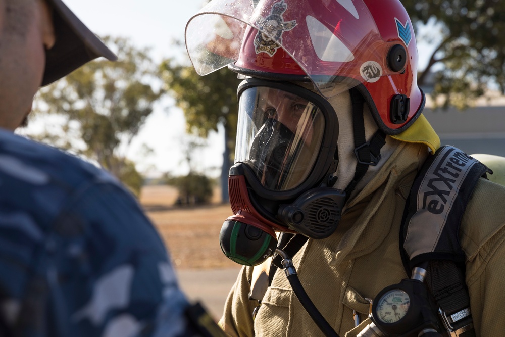 U.S. Marines, RAAF, and RNZAF firefighters conduct conditioning training