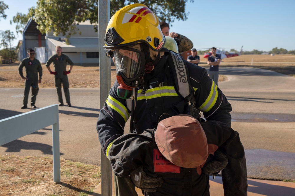 U.S. Marines, RAAF, and RNZAF firefighters conduct conditioning training