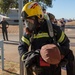 U.S. Marines, RAAF, and RNZAF firefighters conduct conditioning training