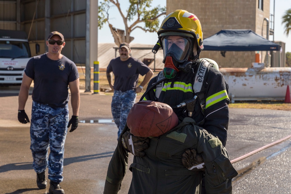 U.S. Marines, RAAF, and RNZAF firefighters conduct conditioning training