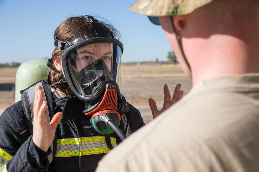 U.S. Marines, RAAF, and RNZAF firefighters conduct conditioning training