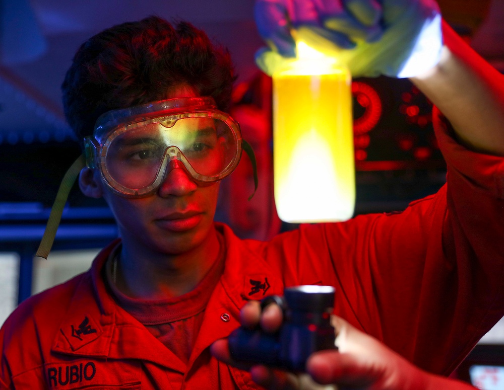 USS Barry Sailor Checks Lube Oil Samples