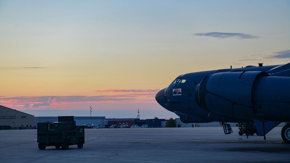 B-52H Stratofortress parked on the flight line during sunrise