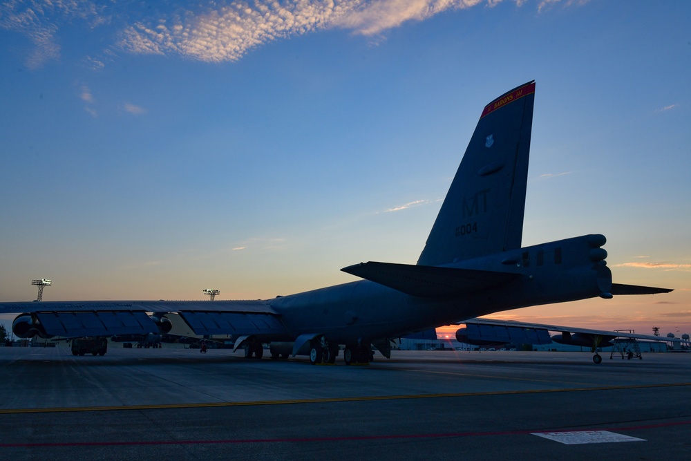 B-52H Stratofortress parked on the flight line during sunrise