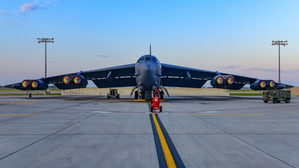 B-52H Stratofortress parked on the flight line during sunrise