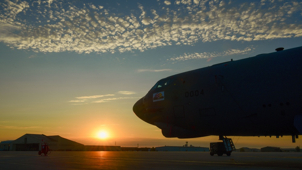B-52H Stratofortress parked on the flight line during sunrise