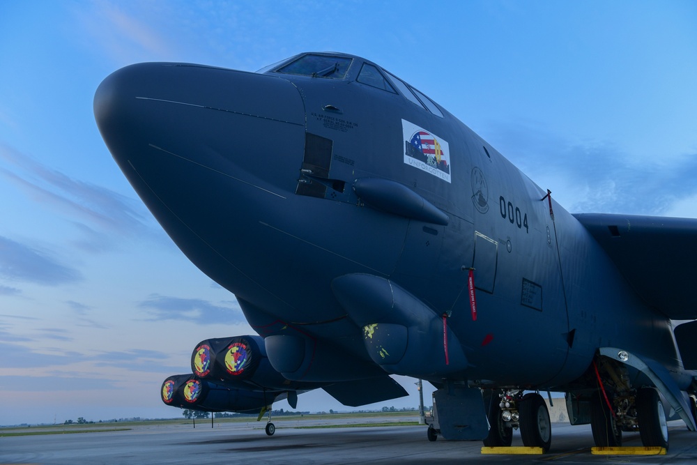 B-52H Stratofortress parked on the flight line during sunrise