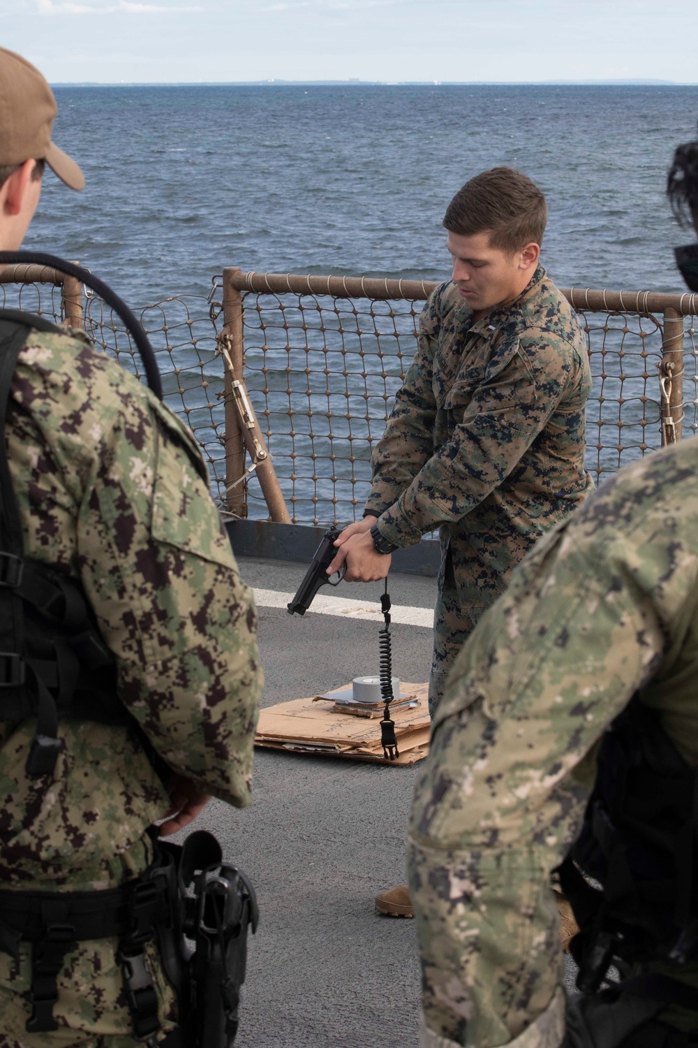 U.S. Marine trains U.S. Navy Sailors