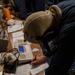 U.S. Navy Sailors Records Data during a Firefighting Drill