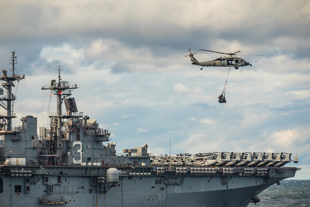 USS Kearsarge (LHD 3) and HSC 28 Conducts VERTREP with USNS William McLean (T-AKE 12)