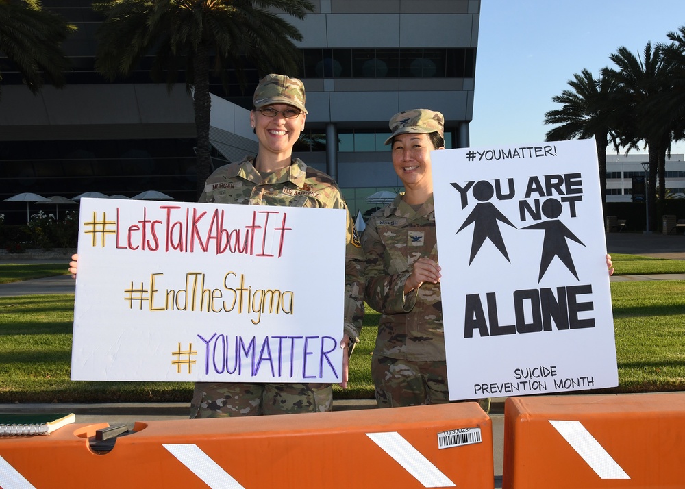 Space Base Delta 3 Commander, Colonel Mia Walsh, and Chief Master Sgt. Sarah Morgan raise suicide awareness for suicide prevention September