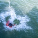 U.S. Marines follow safety demonstrations aboard a Swedish Combat Boat 90