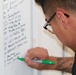 Painting on a cross-country trek stops by JBLM