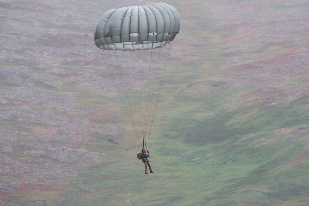 Air Force special warfare Airmen and Army aviators conduct airborne training in Alaska