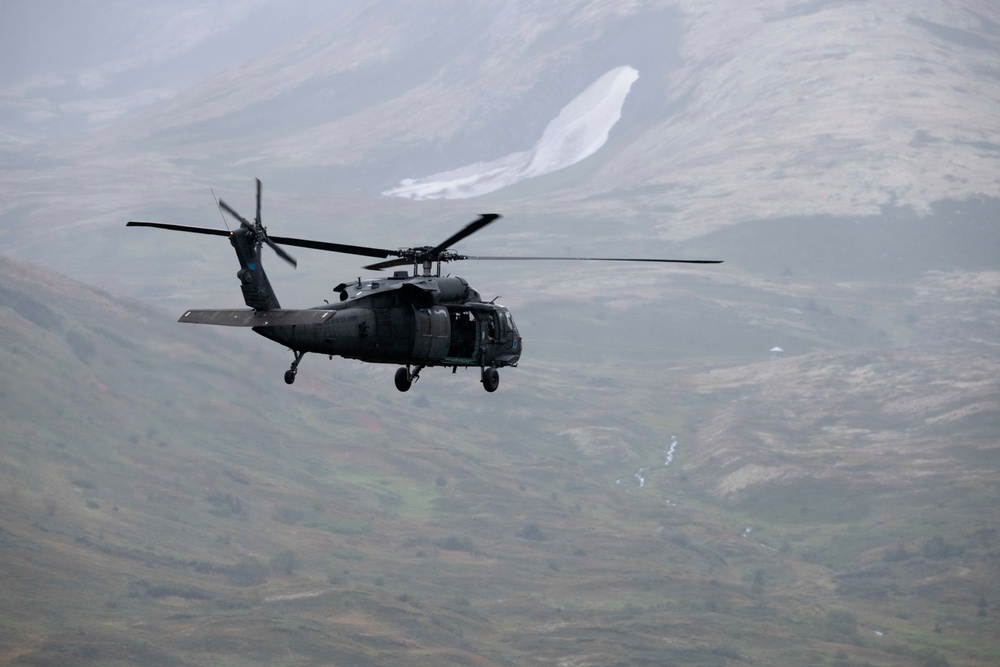 Air Force special warfare Airmen and Army aviators conduct airborne training in Alaska