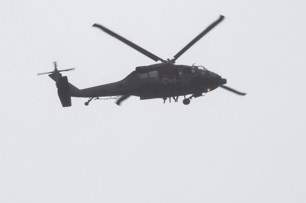 Air Force special warfare Airmen and Army aviators conduct airborne training in Alaska