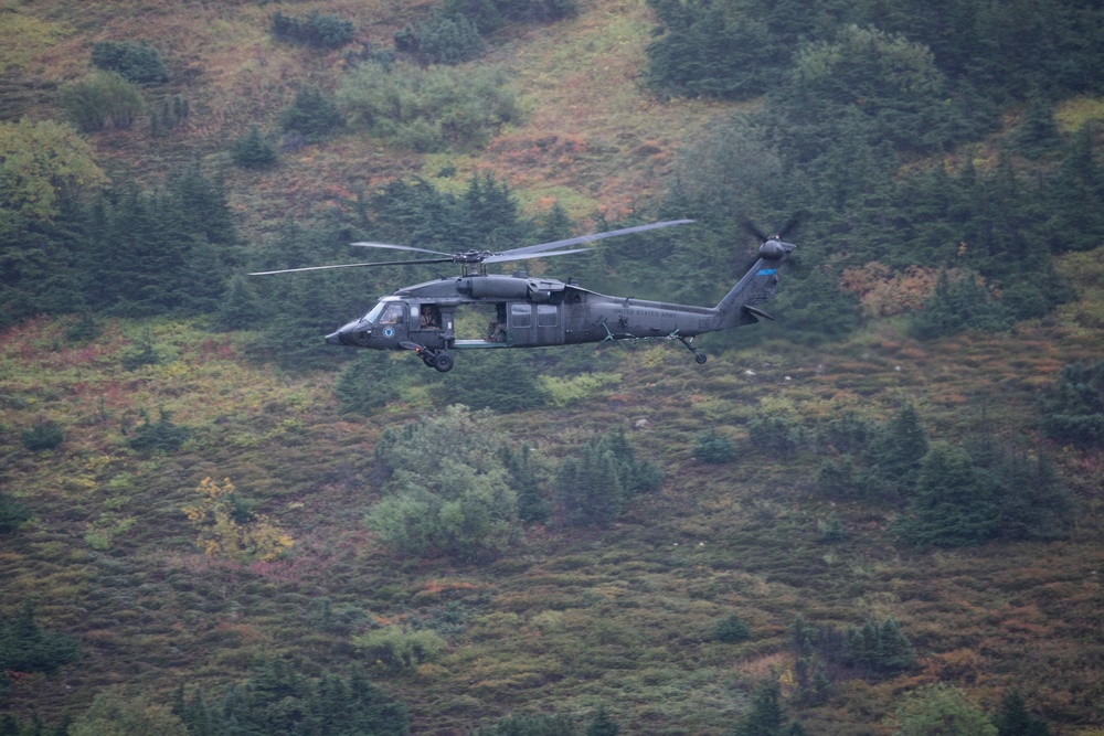 Air Force special warfare Airmen and Army aviators conduct airborne training in Alaska