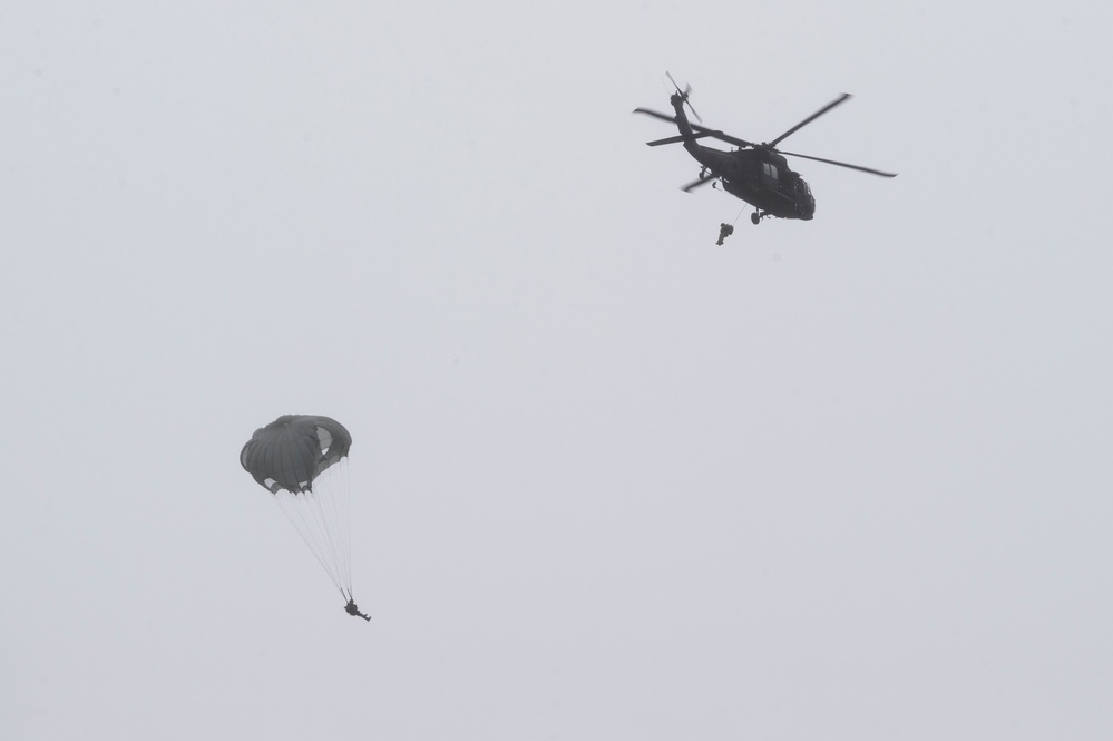 Air Force special warfare Airmen and Army aviators conduct airborne training in Alaska