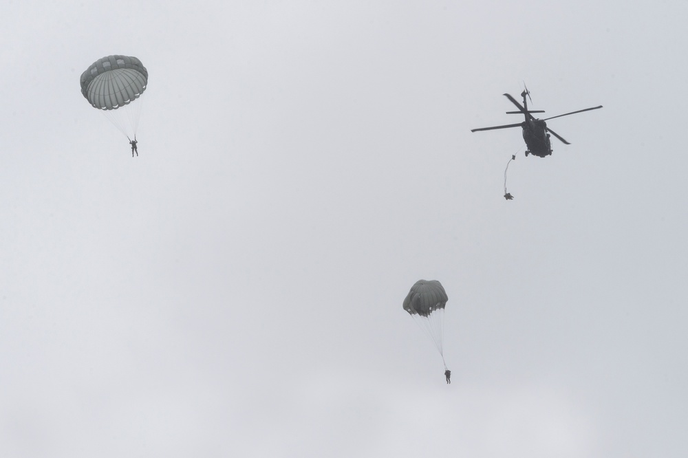 Air Force special warfare Airmen and Army aviators conduct airborne training in Alaska