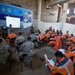 A Mongolia National Emergency Management Agency attends a class on shoring during exercise Gobi Wolf 2022