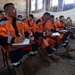 A Mongolia National Emergency Management Agency attends a class on shoring during exercise Gobi Wolf 2022