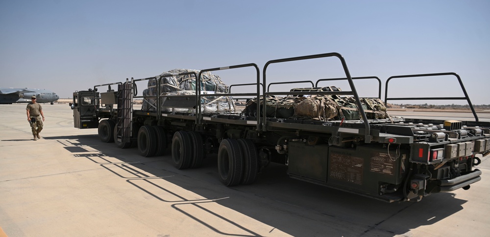 332d Expeditionary Logistics Readiness Squadron loads cargo onto C-130 Hercules